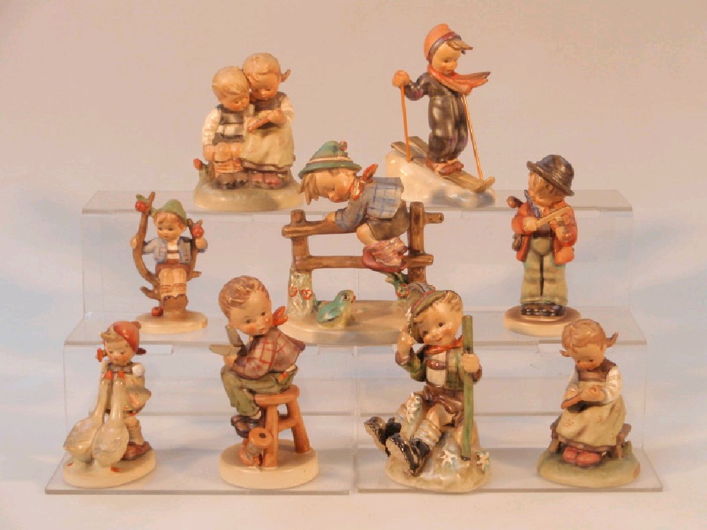 Appraisal: Nine assorted Hummel figures labelled Goose Girl Busy Student Apple