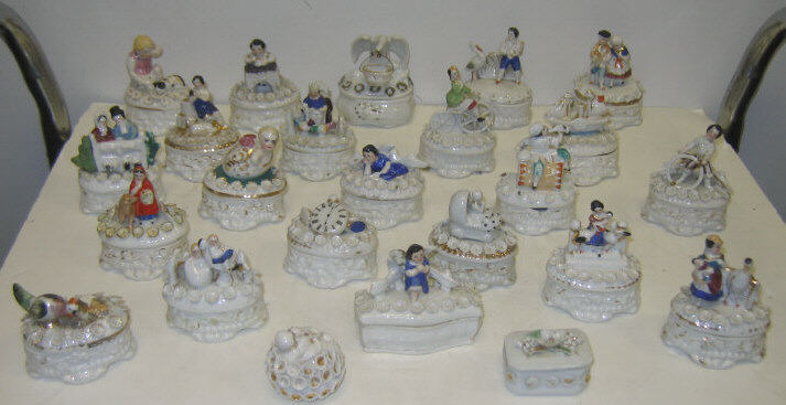 Appraisal: VINTAGE FIGURAL TRINKET BOXES Each porcelain of similar design with