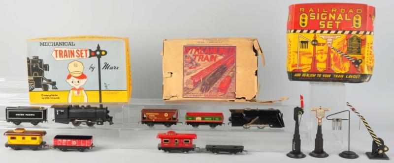 Appraisal: Lot of Tin Marx Train Sets American Two sets are