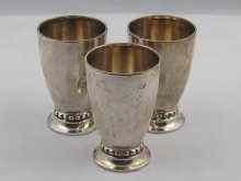 Appraisal: Three Scandinavian silver schnappes beakers tot cups