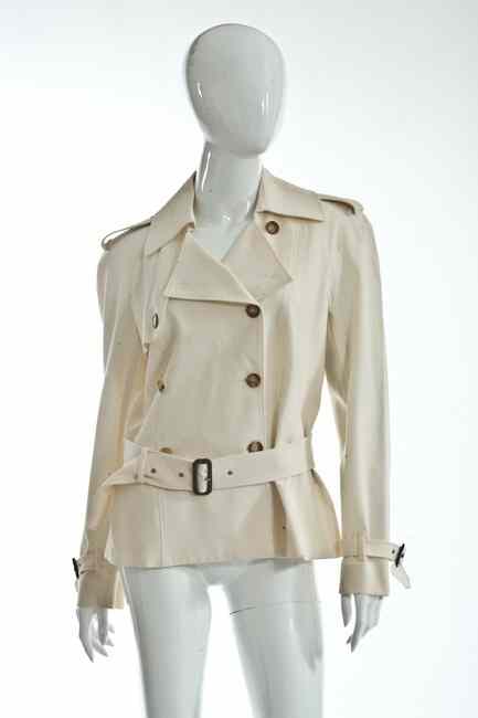 Appraisal: JOHN GALLIANO CREAM TRENCH COAT Contemporary size Hip-length double-breasted