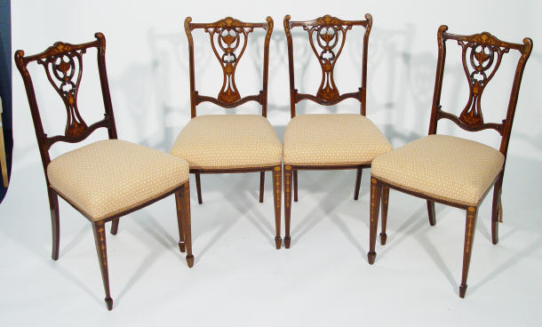 Appraisal: Set of four Victorian inlaid mahogany lyre back dining chairs