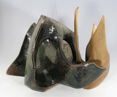 Appraisal: Pamela Rydzewski d Propeller form Spikes Two one glazed earthenware