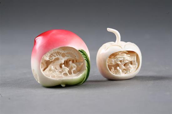 Appraisal: TWO PIECES OF IVORY FRUIT China Peach and persimmon with