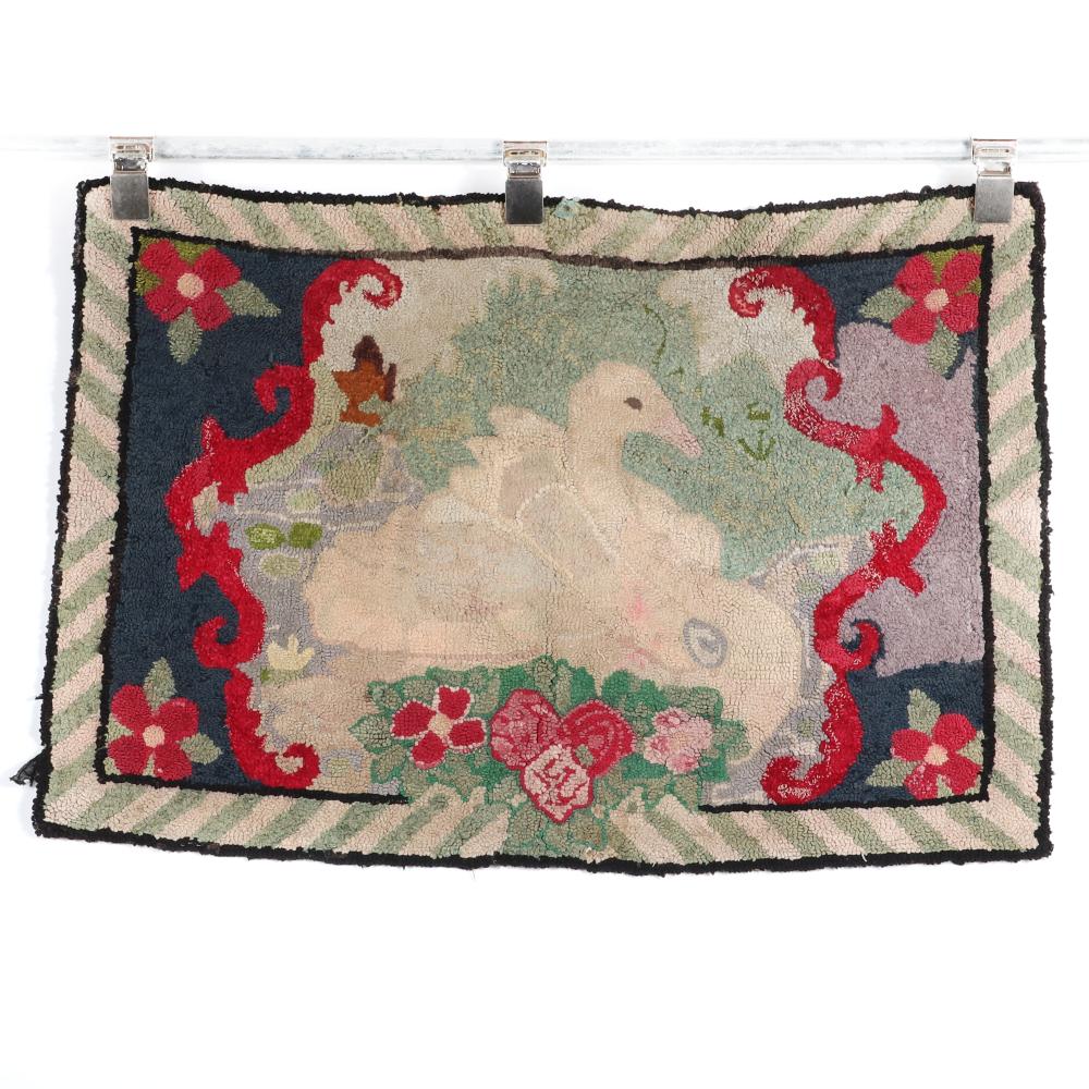 Appraisal: ANTIQUE HOOKED RUG WITH SWAN ROSE FLOWER AND RIBBON DETAILS