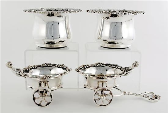 Appraisal: English silverplate wine coaster and trolley set comprising of four