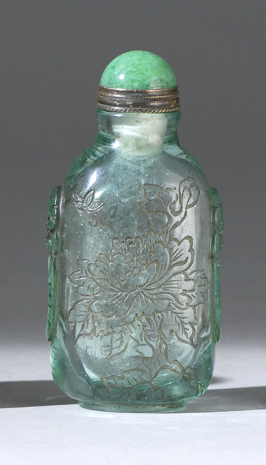 Appraisal: GREEN GLASS SNUFF BOTTLE In spade shape With peony design