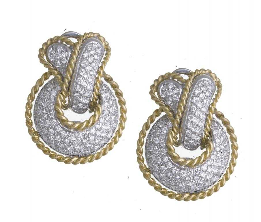 Appraisal: A PAIR OF DIAMOND AND TWO COLOUR GOLD EARRINGS of