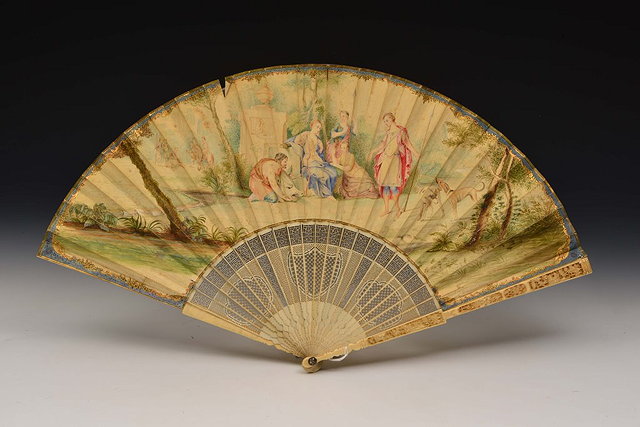 Appraisal: A CHINESE IVORY BRISE AND PAPER FAN made for the