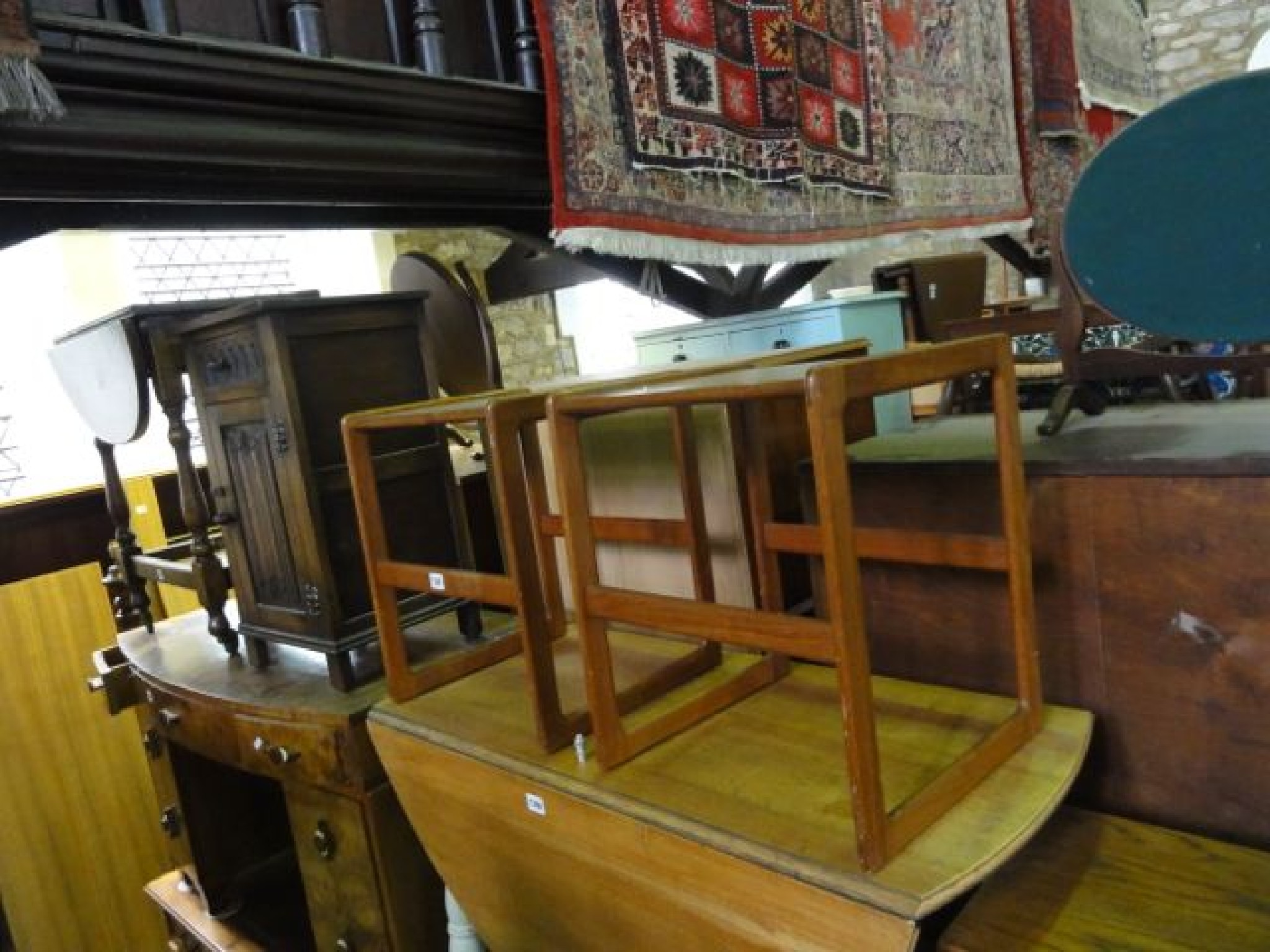 Appraisal: A pair of mid th century design teak occasional tables