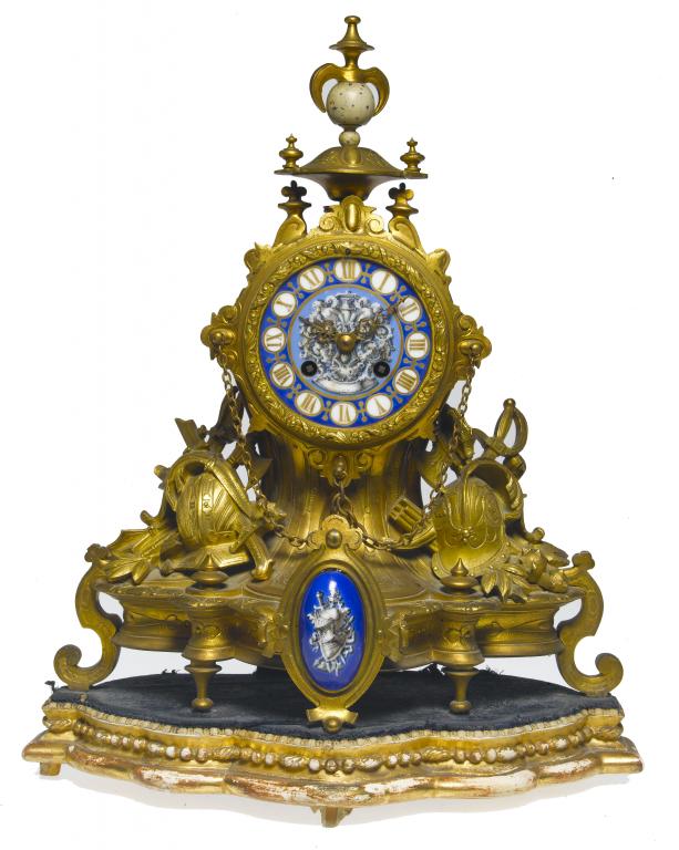 Appraisal: A FRENCH GILTMETAL CLOCK the porcelain dial painted with a