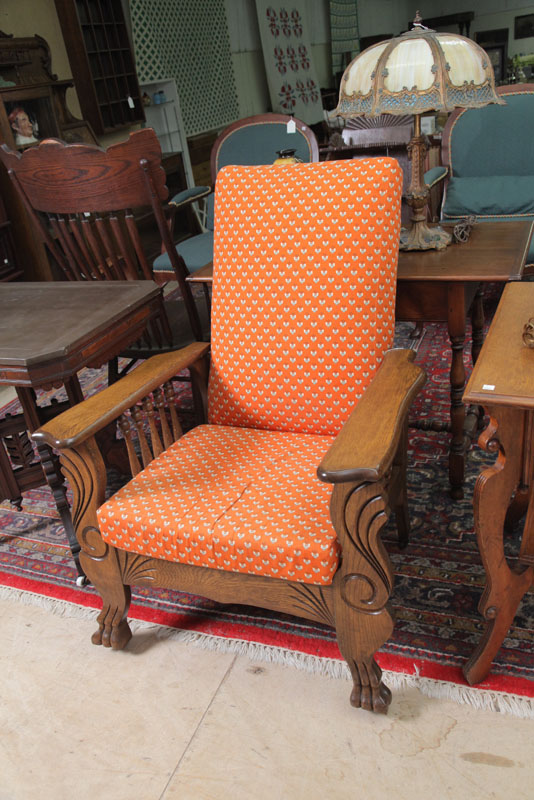 Appraisal: MORRIS STYLE ARMCHAIR Oak with adjustable back banister arms and