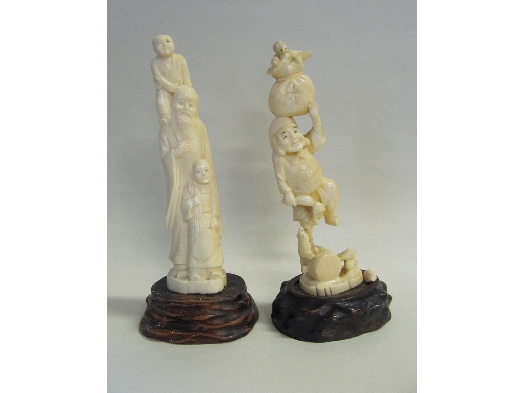 Appraisal: Two carved ivory figure groups one slight def