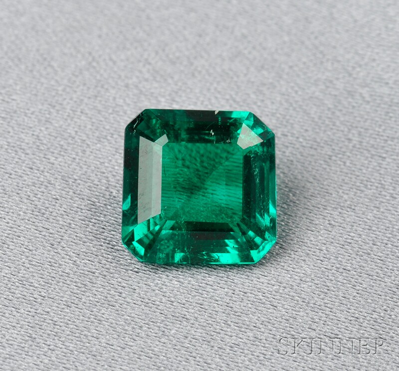 Appraisal: Fine Unmounted Colombian Emerald the emerald-cut emerald measuring approx x