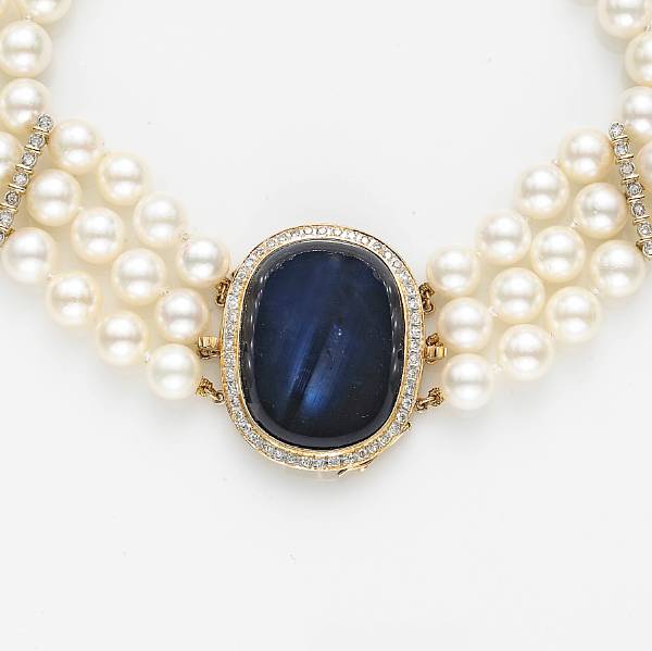 Appraisal: A cultured pearl sapphire diamond and fourteen karat gold necklace