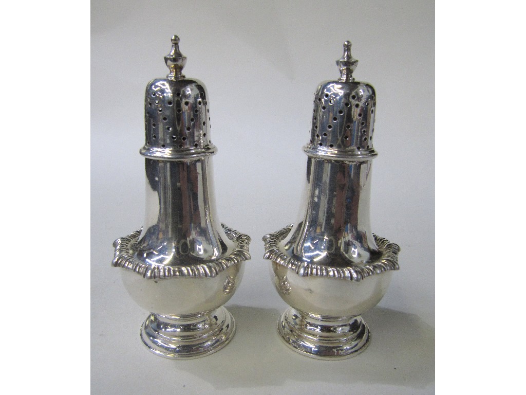 Appraisal: Pair of silver pepperettes Sheffield