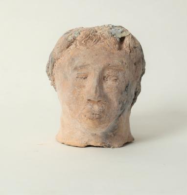 Appraisal: A pottery model of a male head cm high