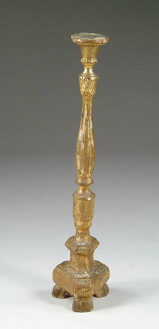 Appraisal: EARLY GILT GESSO DECORATED ALTER CANDLESTICK The turned post supported