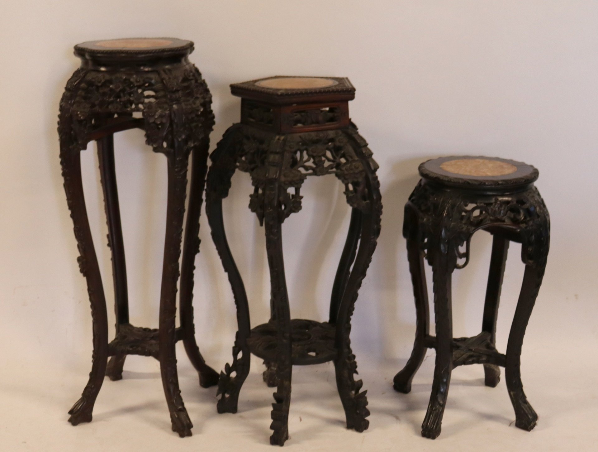 Appraisal: ANTIQUE HIGHLY CARVED CHINESE HARDWOOD STANDS Nice quality and original