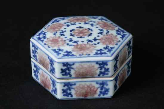 Appraisal: CHINESE COPPER RED AND BLUE PORCELAIN HEXAGONAL BOX Qianlong underglazed