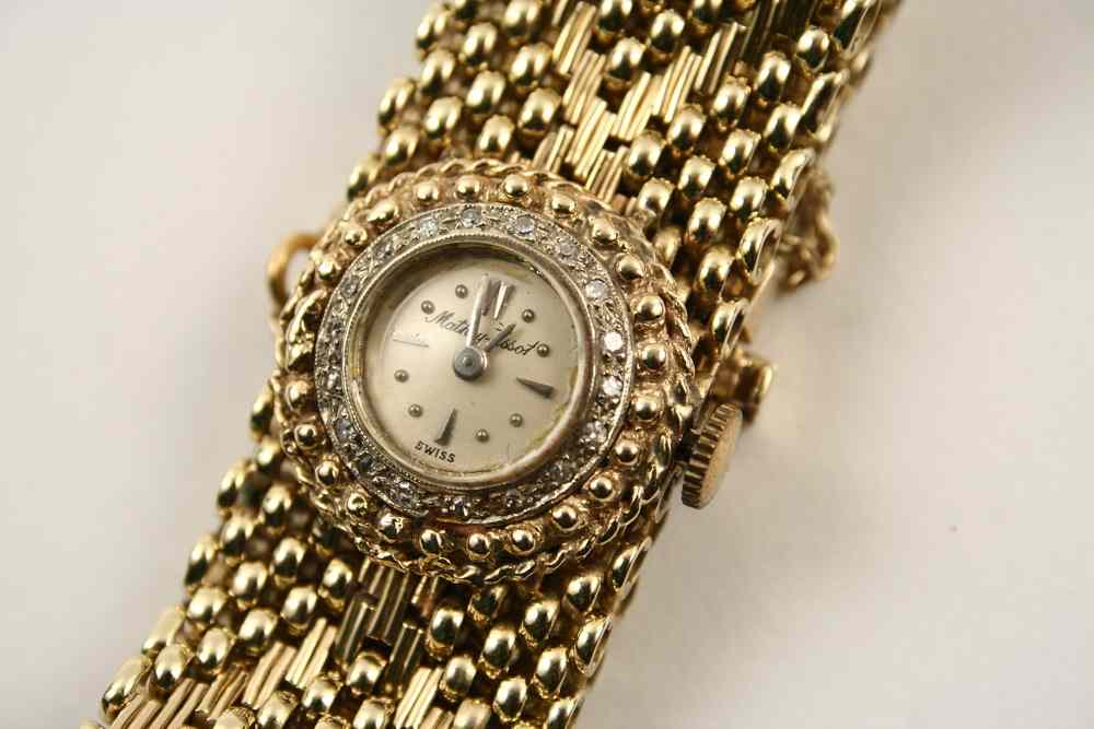 Appraisal: LADY'S WRISTWATCH - K yellow gold and diamond wristwatch Mathey-Tissot