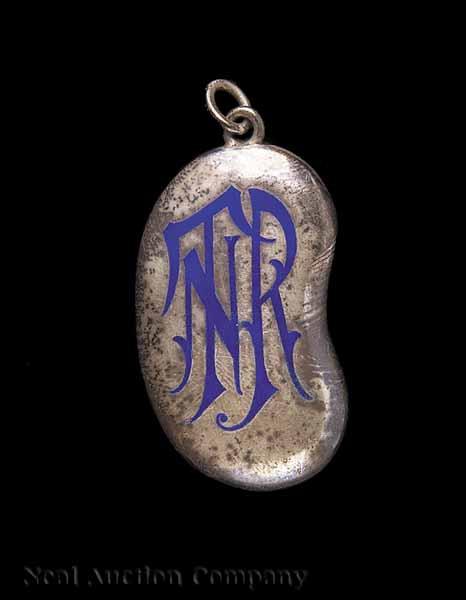 Appraisal: Mardi Gras Twelfth Night Revelers Maid's pendant of silver bean