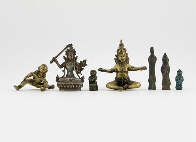 Appraisal: Five bronze and one silver figure including Manjusri a Buddhist