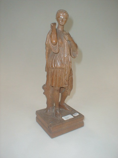 Appraisal: A carved oak figure of a Roman female