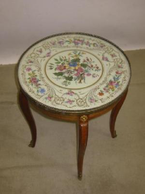 Appraisal: A FRENCH KINGWOOD OCCASIONAL TABLE of circular form the inset