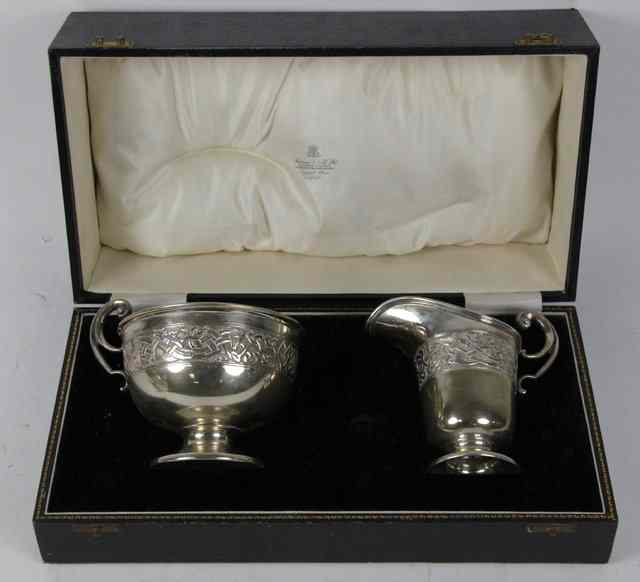 Appraisal: A silver quaich and jug the quaich JW S Birmingham