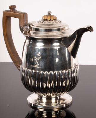 Appraisal: A George III silver hot water jug James Wintle London