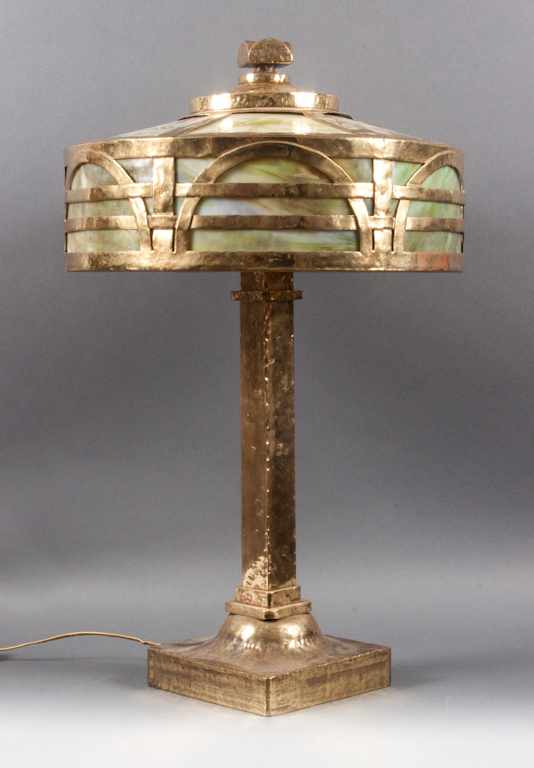 Appraisal: Arts and Crafts style hammered brass and slag glass lamp