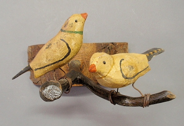 Appraisal: - Hanging folk art with pair of carved and paint