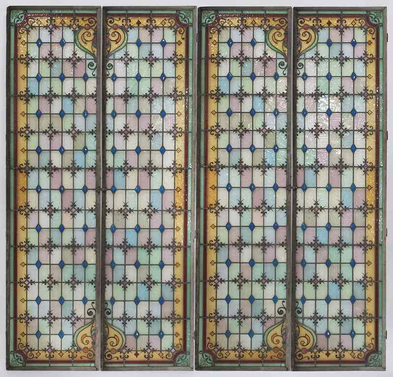 Appraisal: Four panel stained glass windowhaving a geometric pattern design within