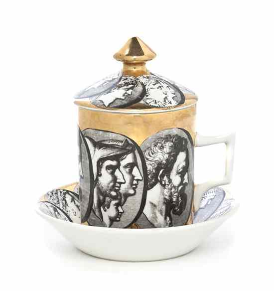 Appraisal: An Italian Porcelain Lidded Cup and Saucer Fornasetti having repeating