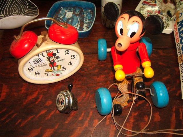 Appraisal: A German Mickey Mouse alarm clock together with an early