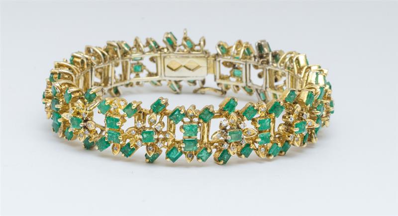 Appraisal: K YELLOW GOLD EMERALD AND DIAMOND BRACELET The flexible bracelet