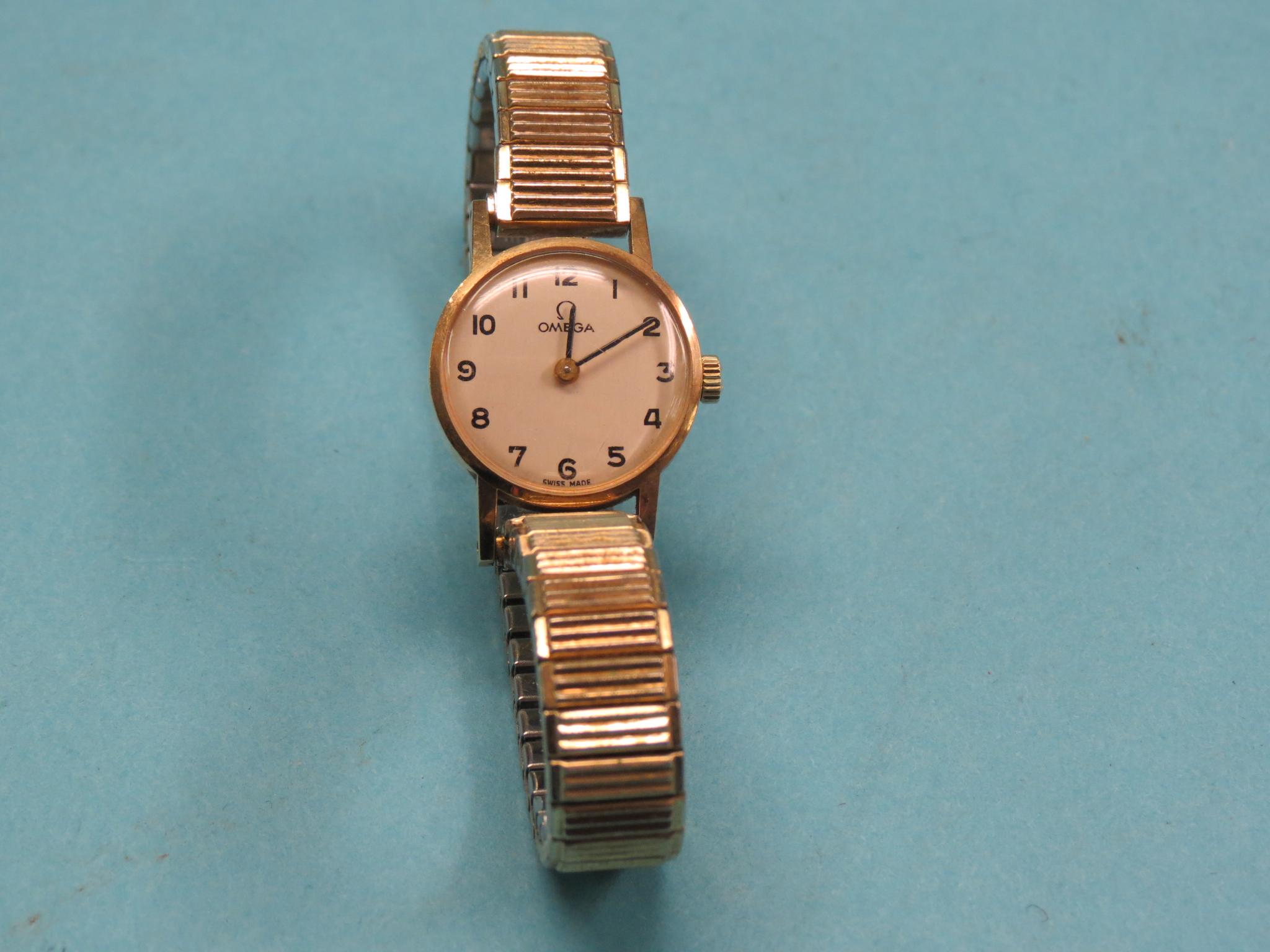 Appraisal: A lady's ct gold Omega wristwatch with expanding metal strap