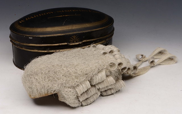 Appraisal: A LAWYERS WIG by Ravenscroft in an oval tin box