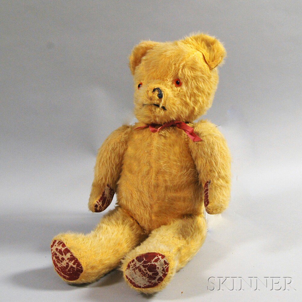 Appraisal: Large Golden Mohair Teddy Bear unlabeled with articulated body orange