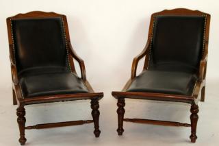 Appraisal: Pair of mahogany and leather chaise longues chairs with nail