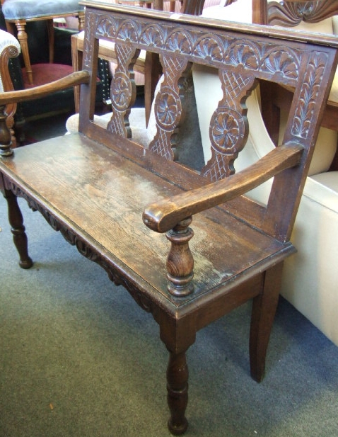 Appraisal: A th century oak bench with triple vase back over