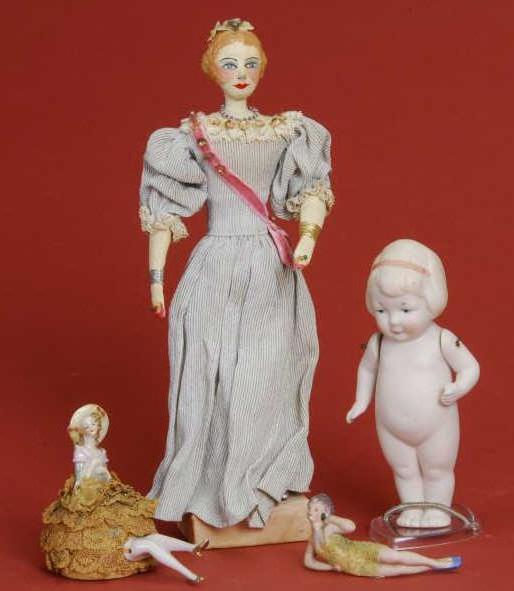 Appraisal: Lot Four Doll Related Items Lot includes molded papier mache