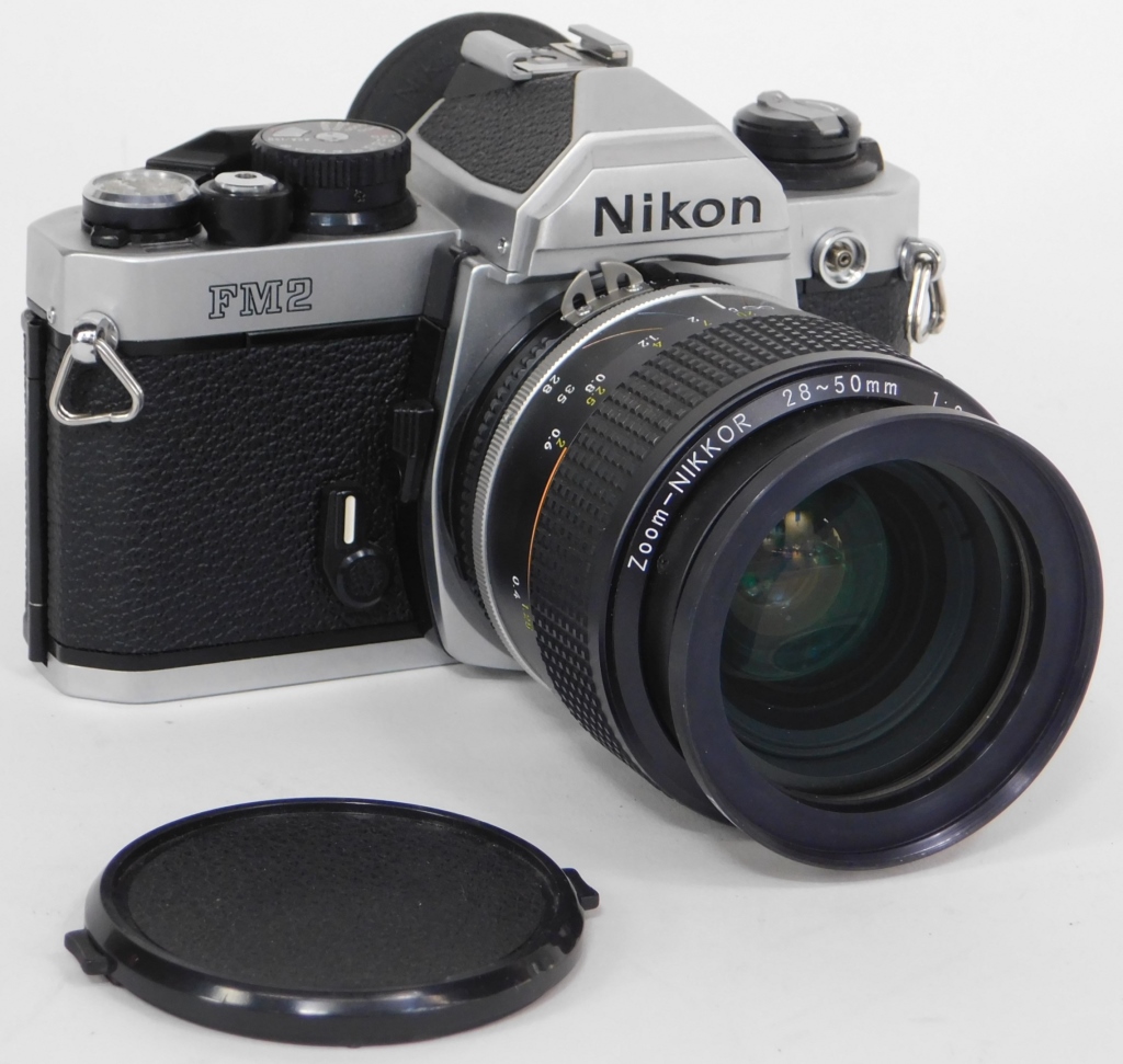 Appraisal: NIKON FM SLR CAMERA ZOOM-NIKKOR - MM F Nikon FM