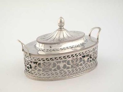 Appraisal: A George III pierced oval butter dish with bead borders