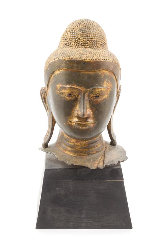 Appraisal: Sale Lot A Burmese Bronze Head of Buddha depicted with