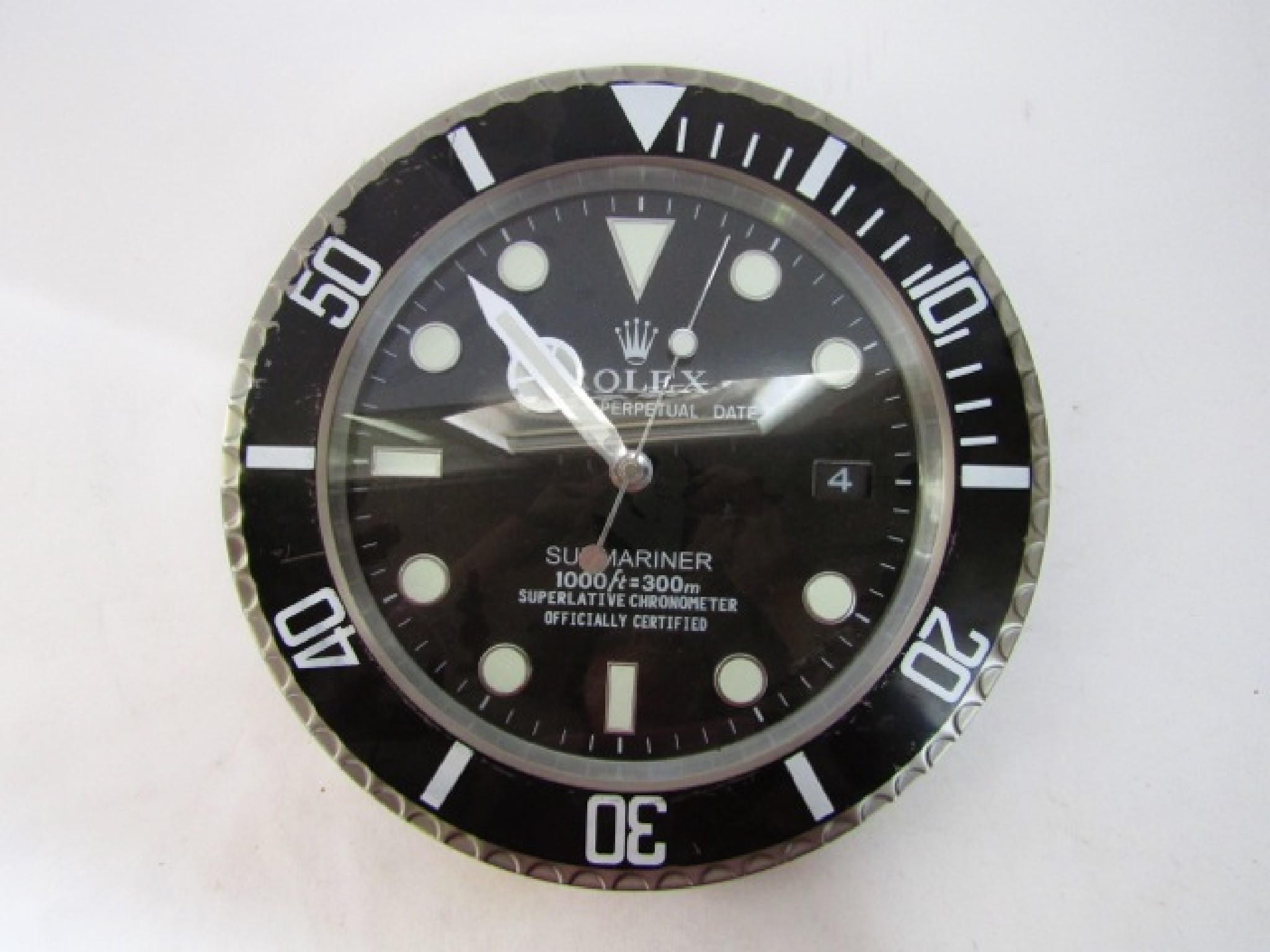 Appraisal: A Rolex wall clock the dial in the form of