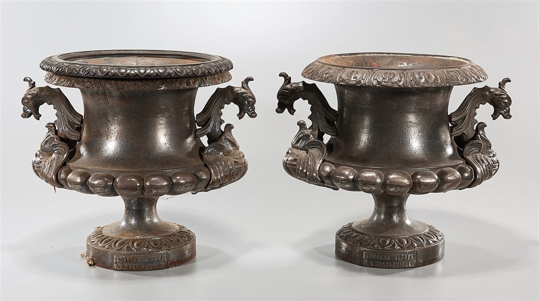 Appraisal: Pair of French Alfred Corneau cast iron urns c with