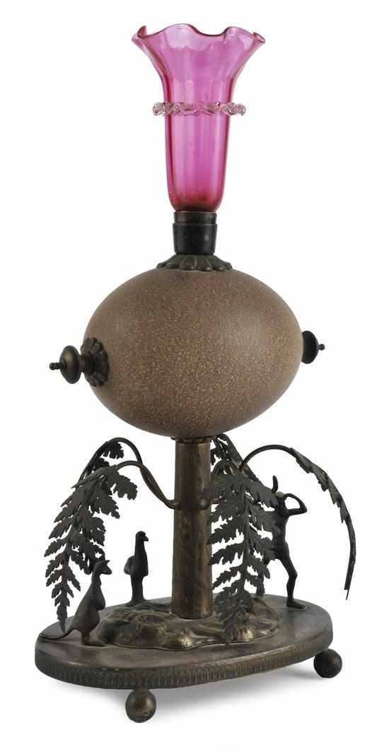 Appraisal: A METAL MOUNTED EMU EGG EPERGNE With a central ruby