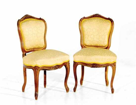 Appraisal: Pair Louis XV style carved fruitwood side chairs late th